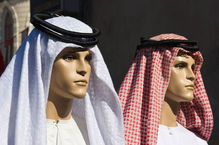 traditional Arabic men's clothing on a mannequin