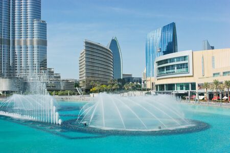 DUBAI, UAE - NOVEMBER 14: The Dancing fountains downtown and in a man-made lake in Dubai, UAE on November 14, 2012. The Dubai Dancing fountains are world's largest fountains with height 150 m.のeditorial素材