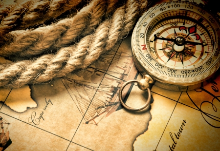 compass and rope on a mapの写真素材