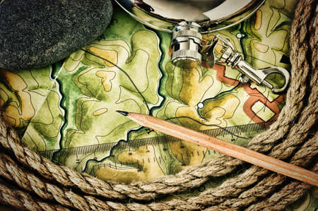 topographic maps and flask whiskey