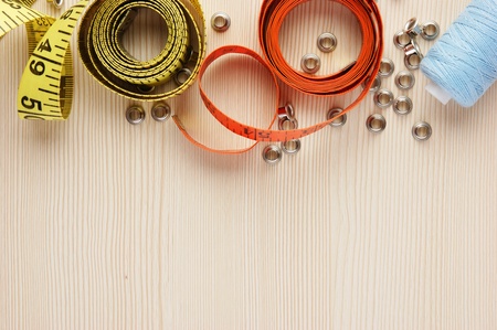 Frame sewing supplies on the tableの写真素材