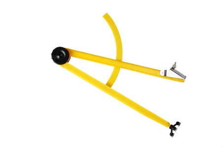 yellow school compasses  isolated on a white backgroundの写真素材