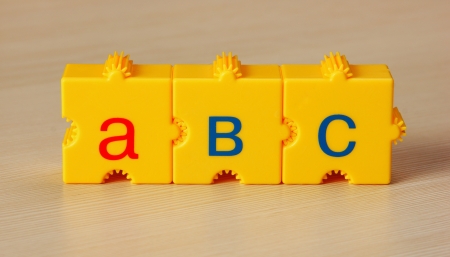 School cubes with letters on the tableの写真素材