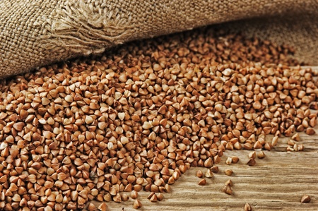 buckwheat groats on a wooden tableの写真素材
