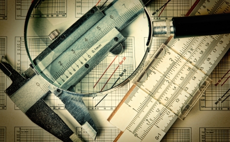 Old engineering tools on a technical drawingの写真素材