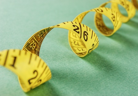 yellow sartorial meter on a green background