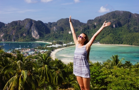 Girl at the resort in a dress on the background of the bays of the island of Phi Phi Donの写真素材