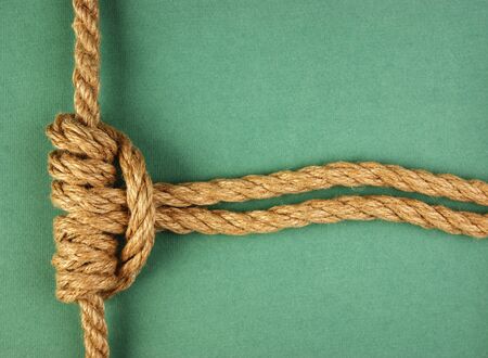 Rope with marine knot  on the green background