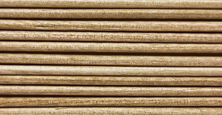 Wooden toothpicks are laid out in a number ofの写真素材