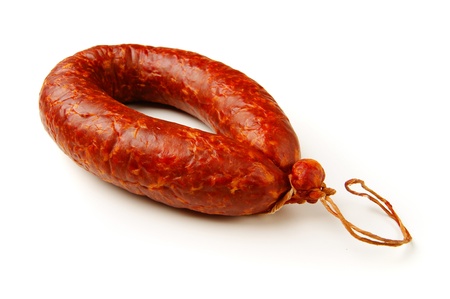 Krakow sausage isolated on white backgroundの写真素材