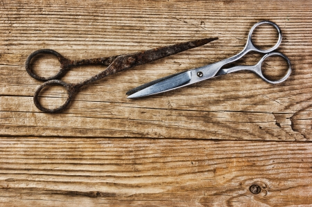 old tailor scissors  on the wooden backgroundの写真素材