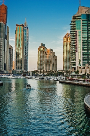 DUBAI, UAE - NOVEMBER 14: Modern buildings in Dubai Marina at sunset, on November 14, 2012, Dubai, UAE. In the city of artificial channel length of 3 kilometers along the Persian Gulf.のeditorial素材