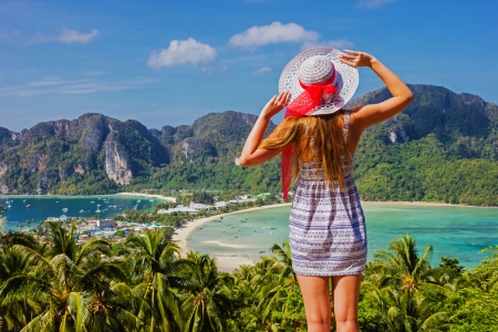 Girl at the resort in a dress on the background of the bays of the island of Phi Phi Donの写真素材