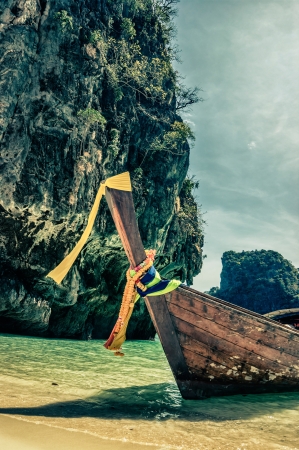 Traditional longtail boats in the famous Maya bay of Phi-phi Leh island, Thailandの写真素材