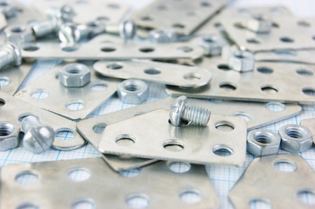 metal parts for constructi on on graph paperの写真素材