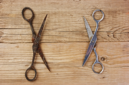 old tailor scissors  on the wooden backgroundの写真素材