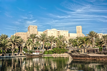 DUBAI, UAE - NOVEMBER 15: Views of Madinat Jumeirah hotel, on November 15, 2012, Dubai, UAE. Madinat Jumeirah - luxury 5 star hotel with own artificial canals and boats.のeditorial素材