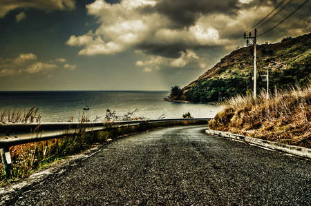 road along the coast in the evening, Phuket, Thailandの写真素材