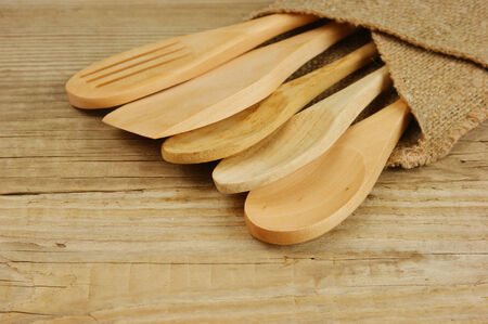 wooden spoon on old wooden tableの写真素材