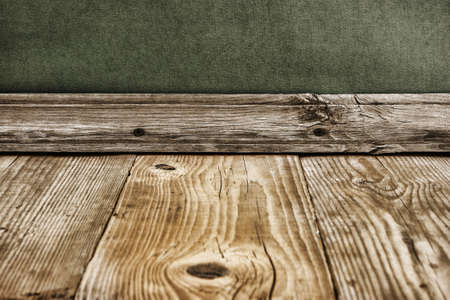 old wooden floor with green wallの写真素材