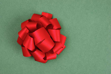 red bow on a green の写真素材