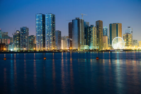 SHARJAH, UAE - NOVEMBER 01: Night view of Sharjah, on November 01, 2013. Sharjah is located along northern coast of Persian Gulf on Arabian Peninsulaの写真素材