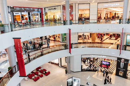 DUBAI, UAE - OCTOBER 31: Inside modern luxuty mall on October 31, 2013 in Dubai. At over 12 million sq ft, it is the world's largest shopping mall based on total area.のeditorial素材