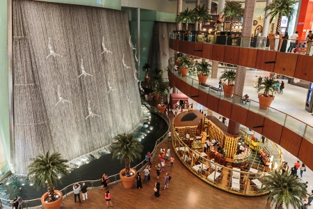 DUBAI, UAE - NOVEMBER 9: Famous Waterfall in Dubai Malll on November 9, 2013 in Dubai. At over 12 million sq ft, it is the world's largest shopping mall based on total area.のeditorial素材