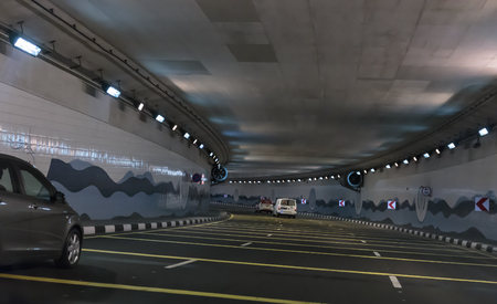 DUBAI, UAE-NOVEMBER 7, 2013: Road tunnel under the bay Creek in Dubai. Dubai was the fastest developing city in the world between 2002 and 2008.のeditorial素材