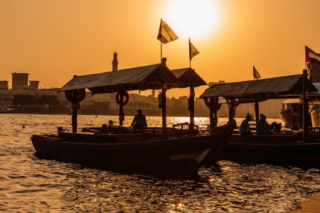 DUBAI, UAE-NOVEMBER 8, 2013: Traditional Abra ferries in Dubai, UAE. Shipbuilding technology is unchanged from the 18th century.のeditorial素材