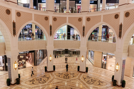 DUBAI, UAE - NOVEMBER 9: Inside modern luxuty mall on November 9, 2013 in Dubai. At over 12 million sq ft, it is the world's largest shopping mall based on total area.のeditorial素材