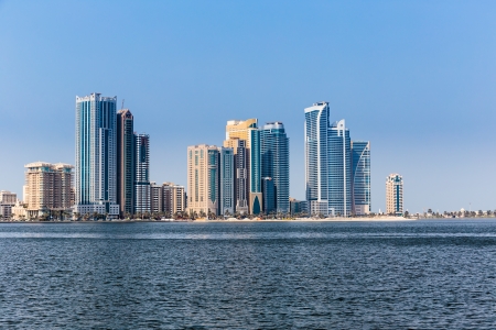 SHARJAH, UAE - OCTOBER 29, 2013: A general view of the waterfront of Sharjah UAE. It is the most industrialized emirate in UAE.のeditorial素材