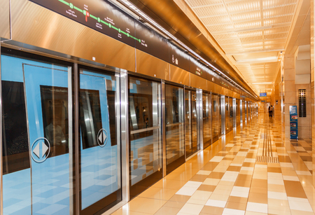 DUBAI, UAE - NOVEMBER 18, 2013: Interior of metro station in Dubai. Metro as world's longest fully automated metro network (75 km) .のeditorial素材