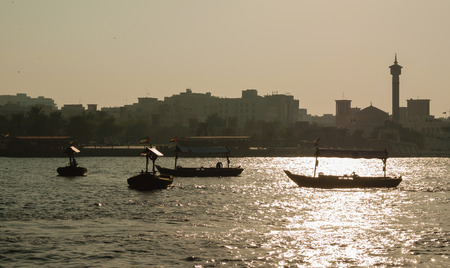 DUBAI, UAE-NOVEMBER 13: Ship in Port Said on November 13, 2012 in Dubai, UAE. The oldest commercial port of Dubaiのeditorial素材
