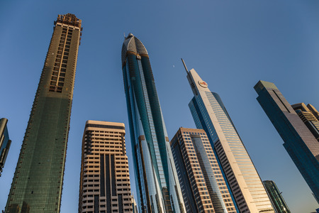 DUBAI, UAE - NOVEMBER 9: Modern buildings in Dubai, on November 9, 2013, Dubai, UAE. Dubai was the...