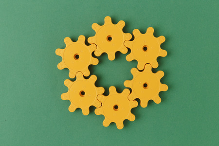 yellow plastic gearsの写真素材