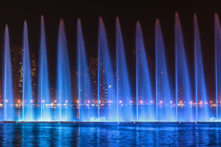 SHARJAH, UAE - OCTOBER 29, 2013: Musical fountain show. The Sharjah Fountain is one of the biggest fountains in the region.のeditorial素材