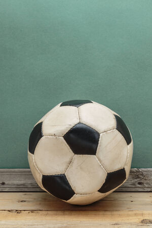 old deflated soccer ballの写真素材