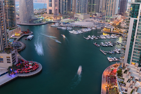 DUBAI, UAE - NOVEMBER 2: Dubai Marina at Dusk from the top, on November 2, 2013, Dubai, UAE. In the city of artificial channel length of 3 kilometers along the Persian Gulf.のeditorial素材