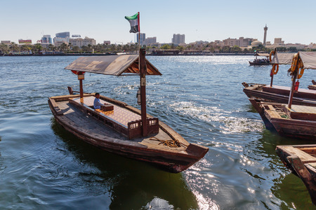DUBAI, UAE-OCTOBER 30: Traditional Abra ferries on November 30, 2013 in Dubai, UAE. Shipbuilding technology is unchanged from the 18th century.のeditorial素材