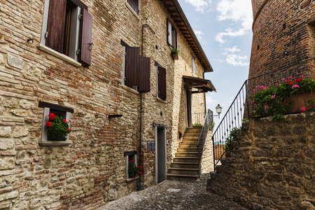 Narrow street in the old town in Italyの写真素材