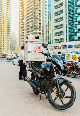 DUBAI, UAE - NOVEMBER 2: Street in the central part  in Dubai, on November 2, 2013, Dubai, UAE. Dubai was the fastest developing city in the world between 2002 and 2008.のeditorial素材