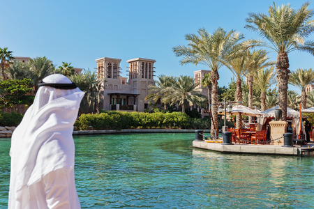 DUBAI, UAE - NOVEMBER 7: Views of Madinat Jumeirah hotel, on November 7, 2013, Dubai, UAE. Madinat Jumeirah - luxury 5 star hotel with own artificial canals and boats.のeditorial素材