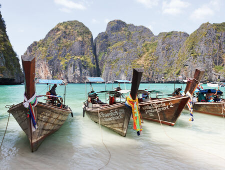 PHUKET, THAILAND - FEBRUARY 16, 2013: Traditional boat on the beach of the island Phi Phi Lehのeditorial素材