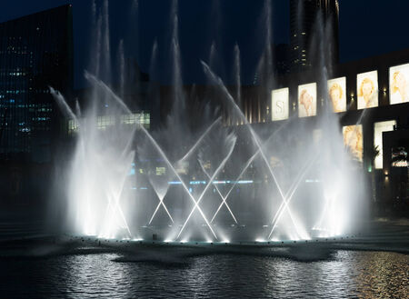 DUBAI, UAE - 31 OCTOBER, 2013: Night view fountains downtown and in a man-made lakeのeditorial素材