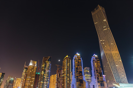 DUBAI, UAE - NOVEMBER 7: General view of Dubai at night, on November 7, 2013, Dubai, UAE. Dubai was...