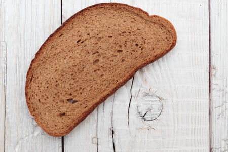 slices of rye bread on a wooden table