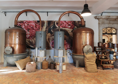 GRASSE, FRANCE - OCTOBER 31, 2014: Ancient distiller for the production of perfume in Fragonard factoryのeditorial素材