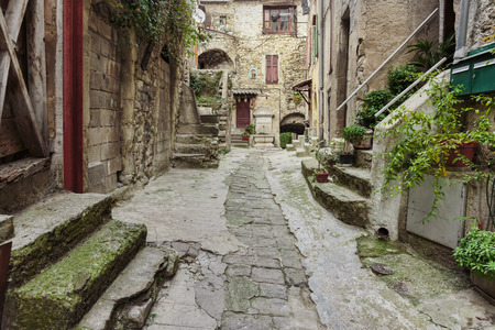 Narrow cobbled streets in the old village Gourdon, France