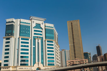 SHARJAH, UAE - OCTOBER 28,  2013: Modern buildings in Sharjah. It is the most industrialized emirate in UAE.のeditorial素材